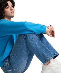 Cross Lauren Jeans in Hellblau mit ausgestelltem Bein