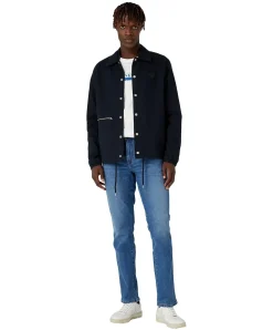 Wrangler Texas Slim Jeans in mittelblauer Maverik Waschung